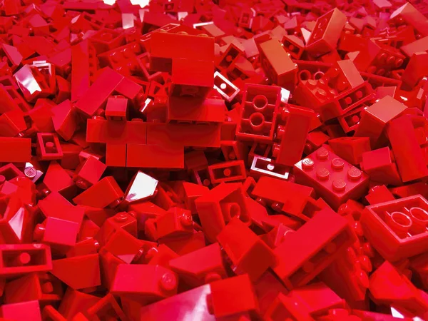 Red Building Pieces Closeup Bright Plastic Constructor Pieces Neatly Accommodation — Stock Photo, Image