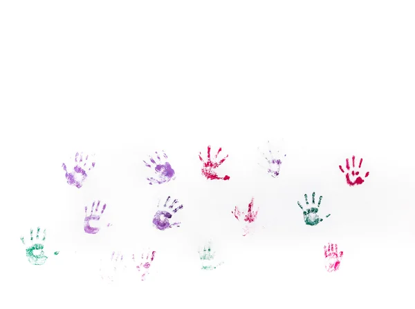 Children's hand prints on white wall — Stock Photo, Image