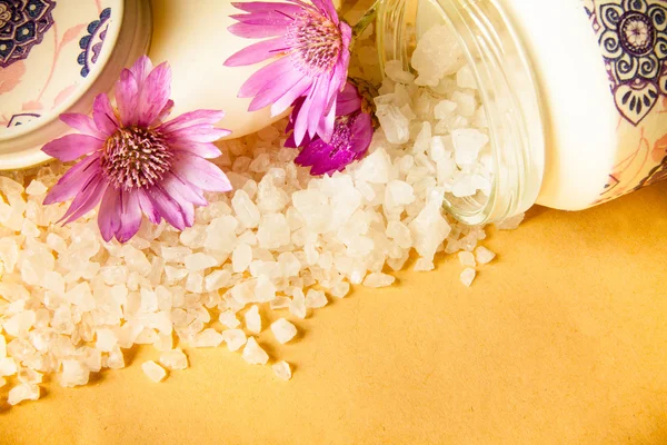 Jar of bath sea salt, soap and violet flowers — Stock Photo, Image