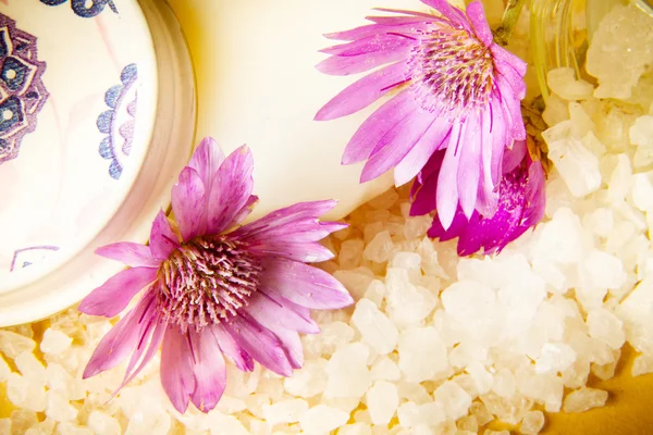 Jar of bath sea salt, soap and violet flowers — Stock Photo, Image