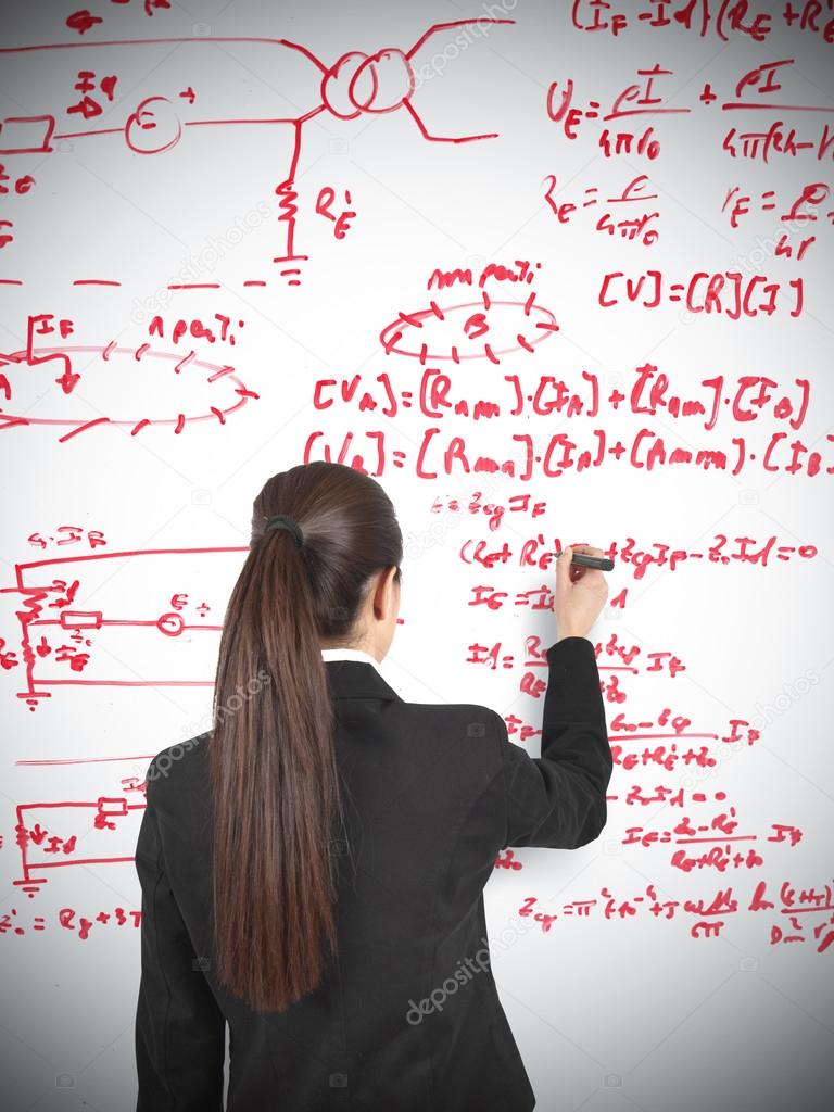 Businesswoman drawing formula