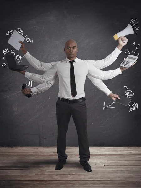 Multitasking businessman — Stock Photo, Image