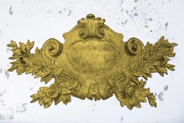 Antiguo emblema de oro — Foto de Stock