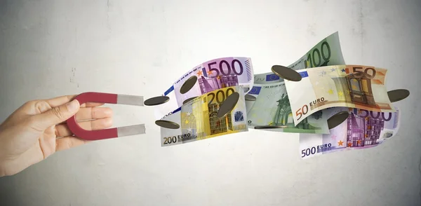 Magneet trekt geld aan — Stockfoto