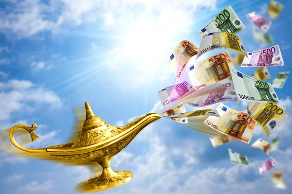 Goldene Lampe und Geld — Stockfoto