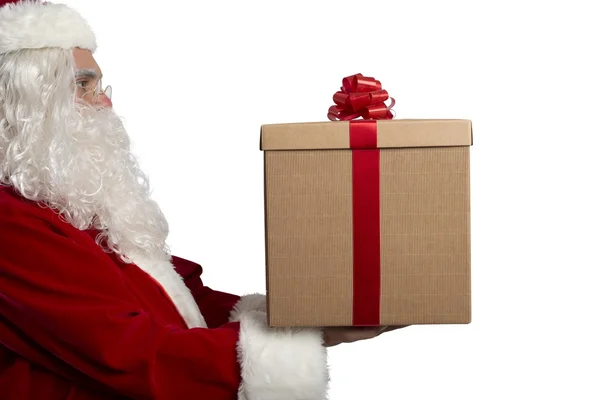 Santa Claus with a present — Stock Photo, Image