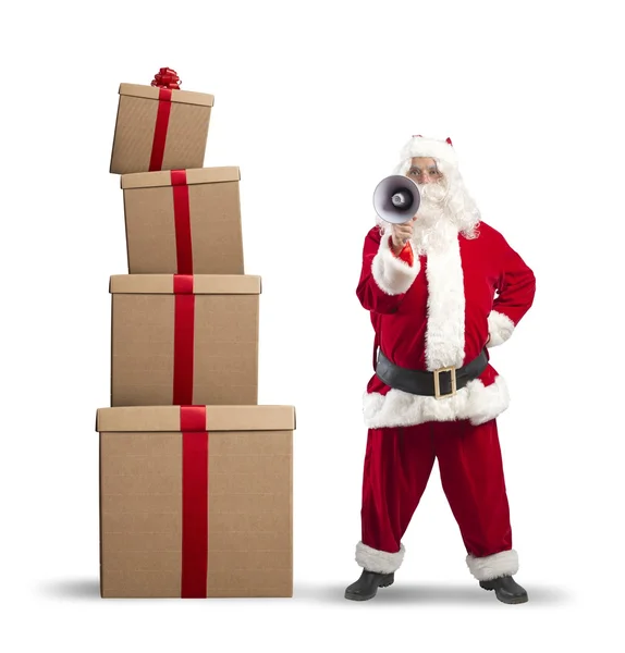 Kerstman met geschenk — Stockfoto