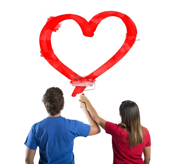 Pareja dibujando un corazón — Foto de Stock