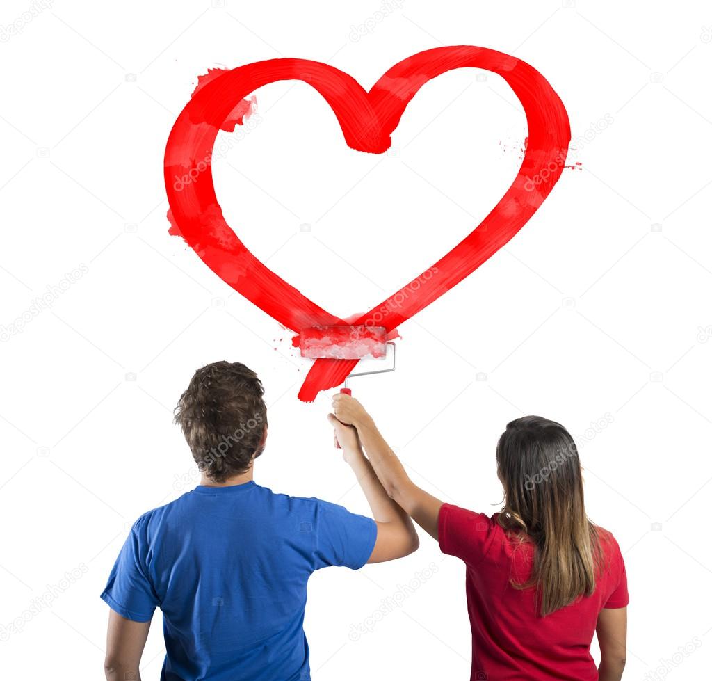 Couple drawing a heart