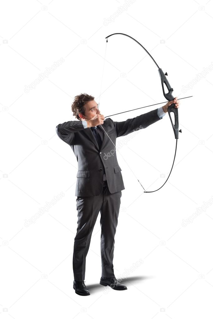 Businessman with bow and arrow