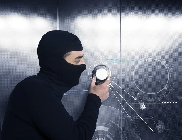 Thief tries to open a safe — Stock Photo, Image