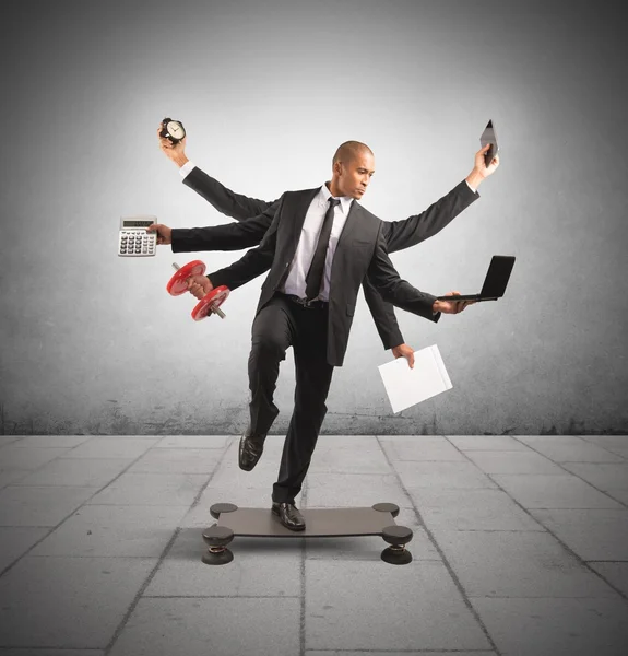 Multitasking businessman — Stock Photo, Image