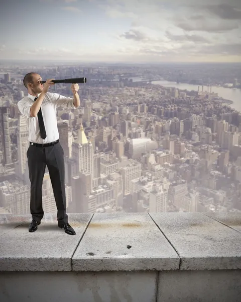 Businessman looks for new business — Stock Photo, Image