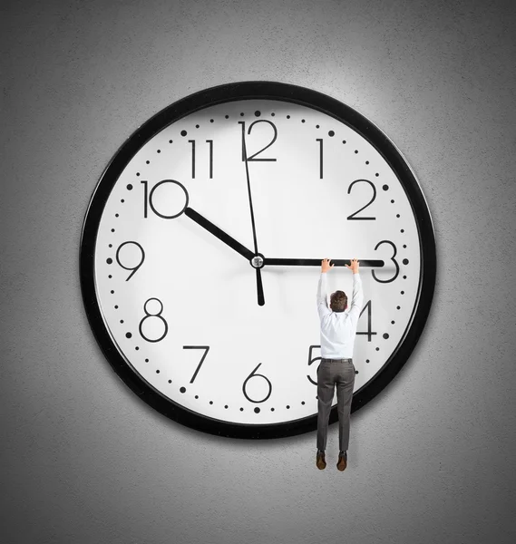 Hanging from the time — Stock Photo, Image