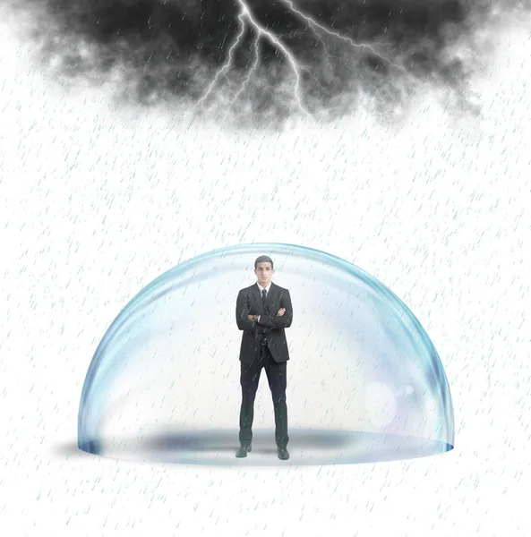 Businessman protected from the crisis — Stock Photo, Image