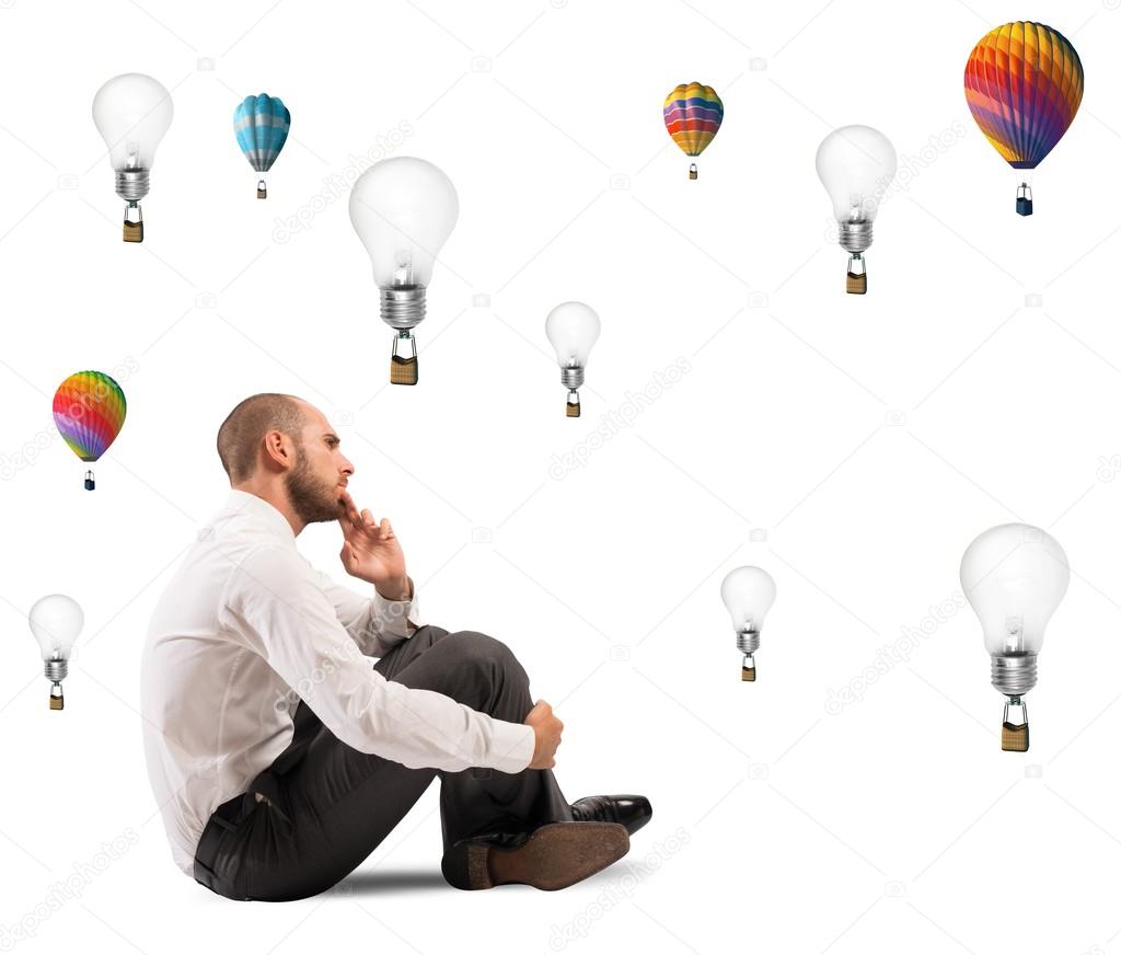 Businessman with flying idea