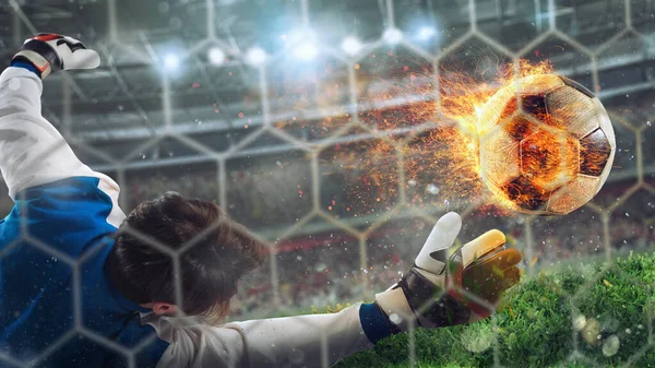 Goalkeeper catches a fast fiery soccer ball — Stock Photo, Image