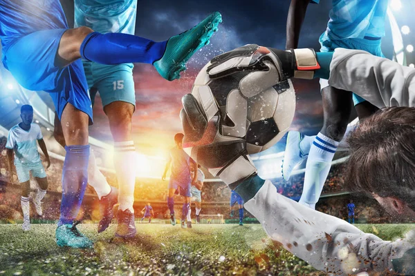Футбольная сцена с футболистами и вратарем на стадионе — стоковое фото