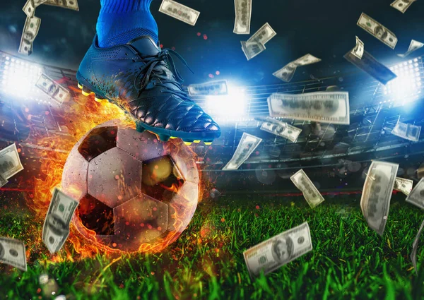 Soccer player with a fiery ball and falling banknotes in stadium — Stock Photo, Image