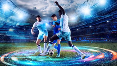 Stadyumda futbol oyuncularıyla teknoloji analizi yapılan futbol sahnesi.