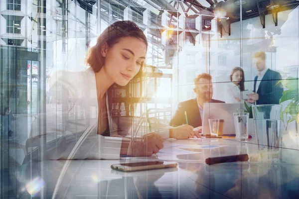 Business people in office work together during a meeting