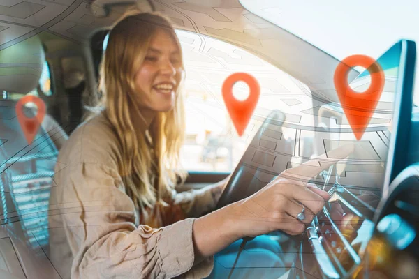 Woman selects the destination with car gps navigator — Stock Photo, Image