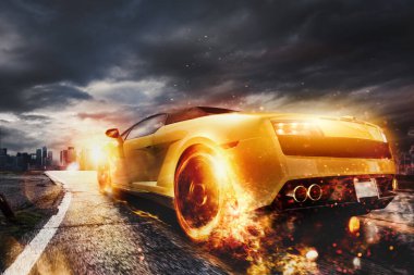 Modern sarı araba yüksek hızdan dolayı asfaltı yakıyor.