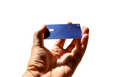 Man pays with a contactless rechargeable credit card