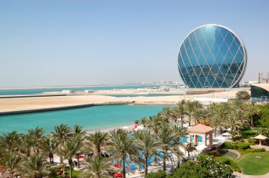 The luxury hotel and circular building, Abu Dhabi, UAE clipart