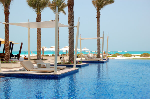 Swimming pool near beach at the luxury hotel, Saadiyat island, A