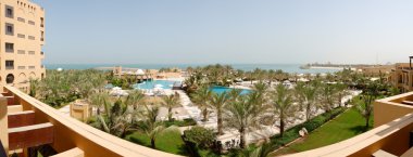 The panorama of beach at luxury hotel, Ras Al Khaimah, UAE clipart
