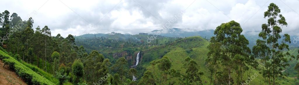 The panorama of tea plantations and waterfall in Nuwara Eliya, S