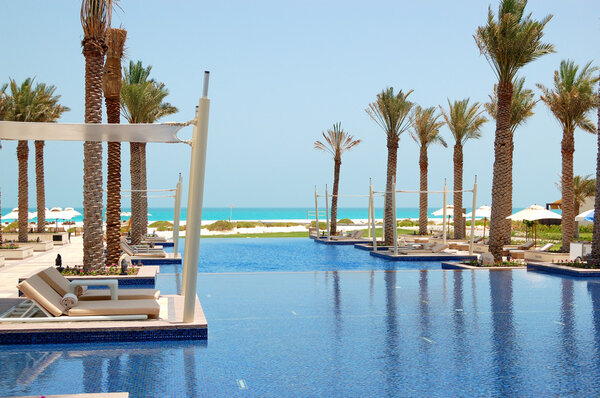 Huts at swimming pool of the luxury hotel, Saadiyat island, Abu