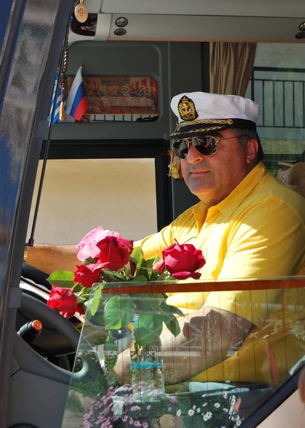 HALKIDIKI, GREECE - APRIL 27: The Greek driver of modern bus for — Stock Photo, Image