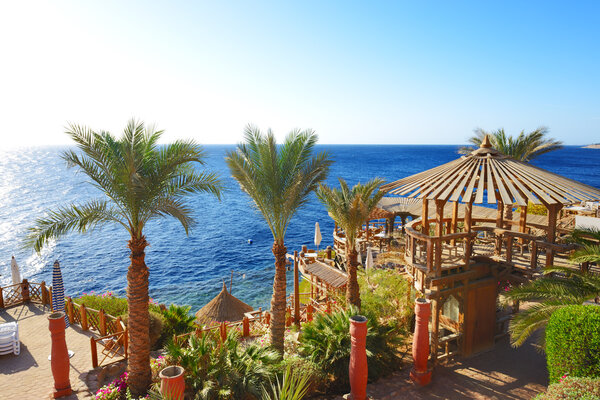 Outdoor restaurant and beach at the luxury hotel, Sharm el Sheik