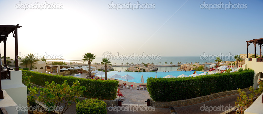 Panorama of the beach at luxury hotel in sunset, Ras Al Khaima, 