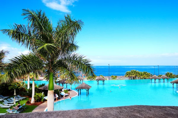 Swimming pool and beach at luxury hotel, Tenerife island, Spain Stock Picture