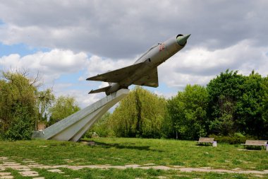 BILA TSERKVA, UKRAINE - MAY 15: The view on MIG-21 supersonic jet fighter and interceptor aircraft memorial dedicated to Soviet pilots who release of Bila Tserkva town from German invadors in Second World War on May 15, 2022 in Bila Tserkva, Ukraine.