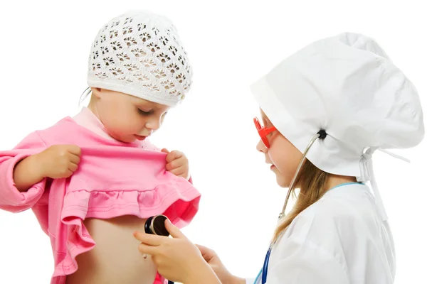 Merry children playing as doctor and patient — Stock Photo, Image