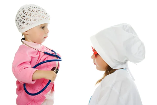 Joyeux enfants jouant comme médecin et patient — Photo