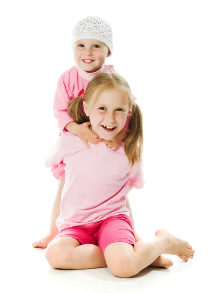 Big sister, little sister hugging — Stock Photo, Image