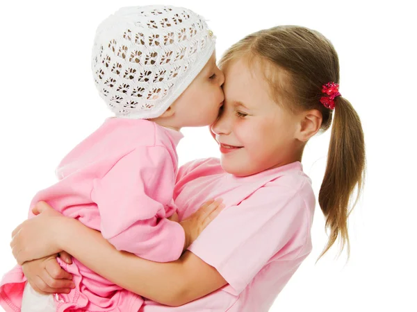 Big sister, little sister hugging — Stock Photo, Image