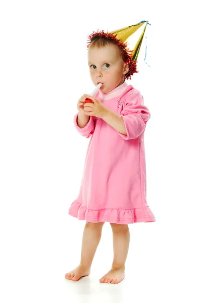 Meisje in roze jurk en een hoed op zijn verjaardag — Stockfoto