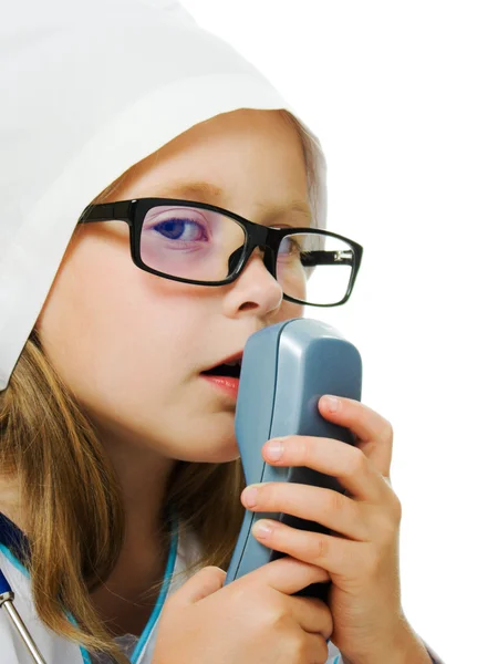 Cute little girl is playing doctor — Stock Photo, Image