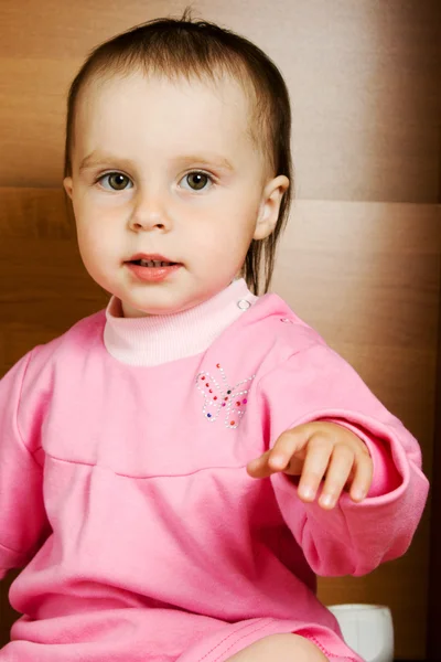 Menina bebê em vestido rosa — Fotografia de Stock