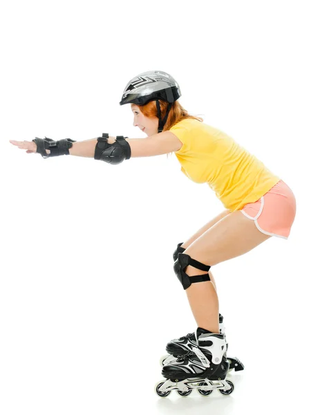 Красива молода жінка на роликових ковзанах — стокове фото