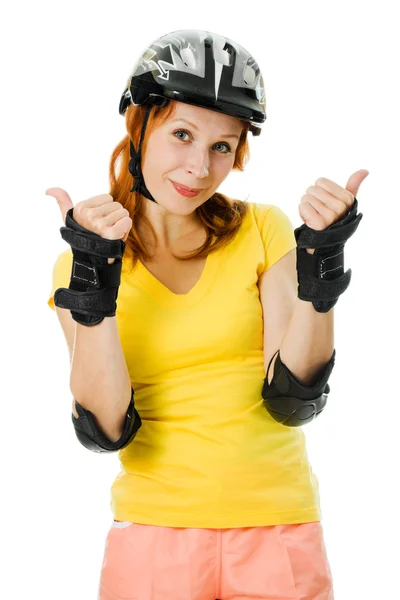 Mooie jonge vrouw op rolschaatsen — Stockfoto