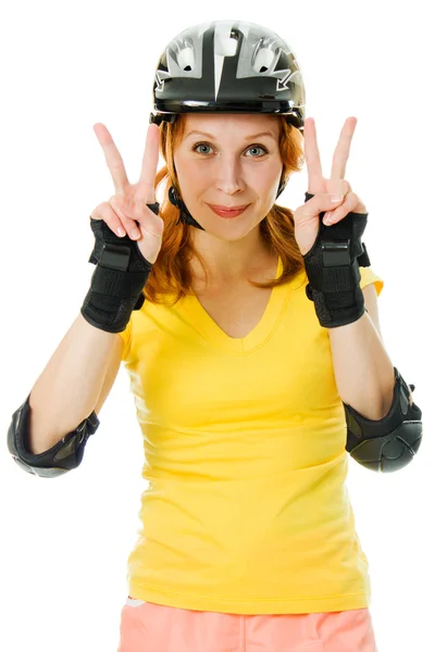 Beautiful young woman on roller skates — Stock Photo, Image