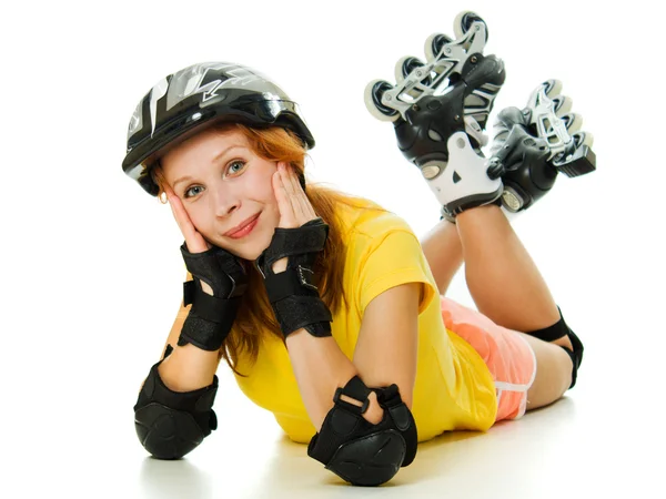 Bela jovem mulher em patins — Fotografia de Stock