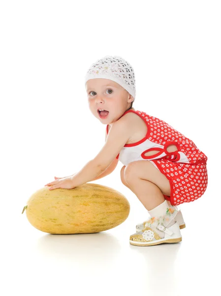 An adorable baby happily playing melon — Stock Photo, Image